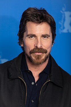A headshot portrait of Bale in 2019