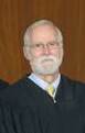 William Curtis Bryson ผู้พิพากษาอาวุโสและผู้เชี่ยวชาญด้านกฎหมายสัญญาภาครัฐของสหรัฐฯ