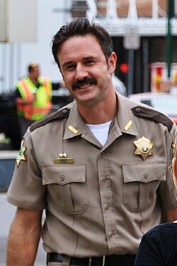 David Arquette เส้นทางชีวิตจากดาราหนัง Scream สู่แชมป์มวยปล้ำผู้สร้างตำนาน