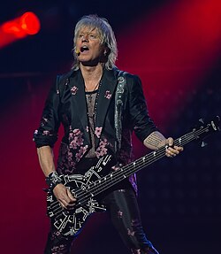 Rick Savage performing in 2025
